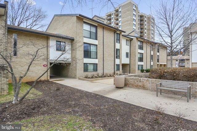 146 Monroe St Unit 101, Rockville, MD 20850 - view of apartment building / complex