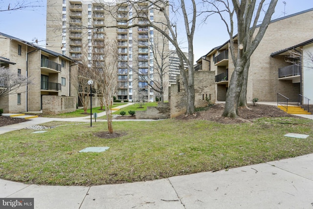 146 Monroe St Unit 101, Rockville, MD 20850 - surrounding community with a yard