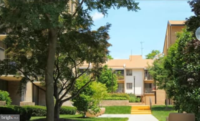 146 Monroe St Unit 101, Rockville, MD 20850 - view of community featuring a lawn
