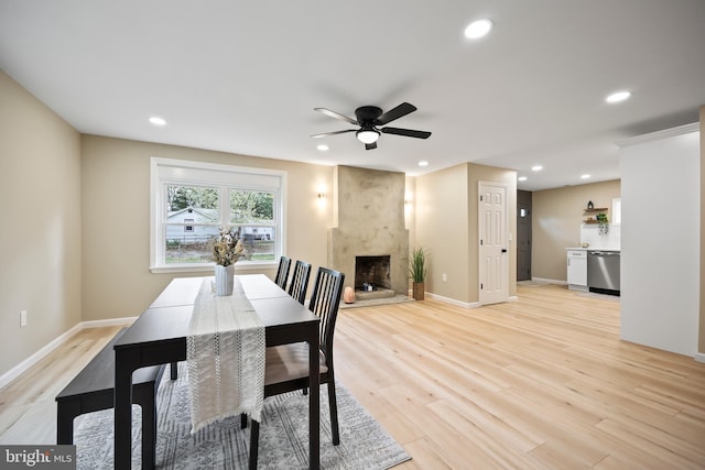 702 Lupin St, Browns Mills, NJ 08015 - dining area featuring ceiling fan, recessed lighting, a high end fireplace, light wood-style floors, and baseboards