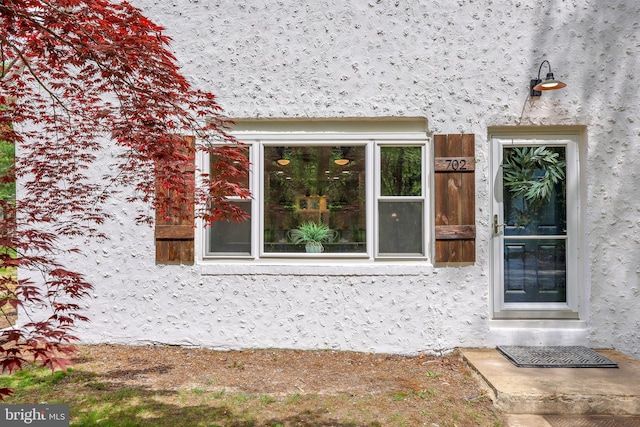 702 Lupin St, Browns Mills, NJ 08015 - property entrance featuring stucco siding