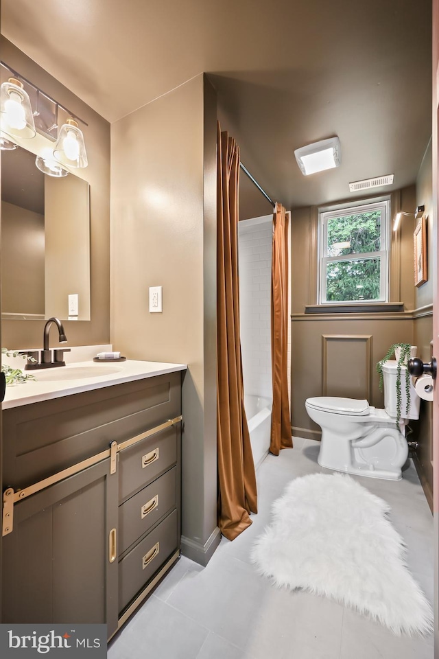 702 Lupin St, Browns Mills, NJ 08015 - bathroom featuring toilet, vanity, shower / tub combo, baseboards, and tile patterned floors