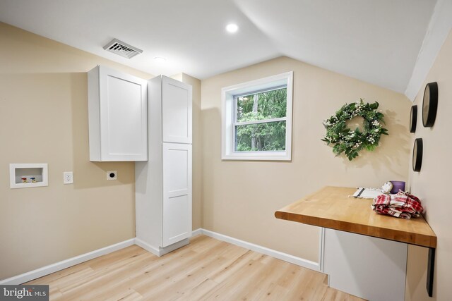 702 Lupin St, Browns Mills, NJ 08015 - washroom with hookup for an electric dryer, hookup for a washing machine, cabinet space, light wood-style flooring, and baseboards
