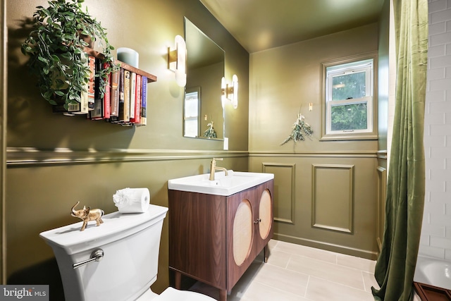 702 Lupin St, Browns Mills, NJ 08015 - full bathroom with tile patterned floors, vanity, toilet, and curtained shower