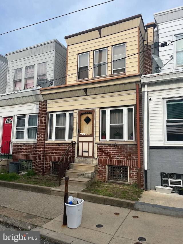 5721 N Lawrence St, Philadelphia, PA 19120 - townhome / multi-family property featuring entry steps and brick siding