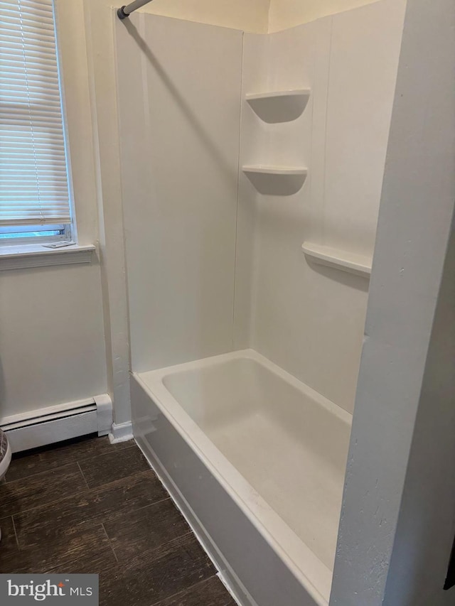 bathroom featuring a baseboard radiator and wood finished floors