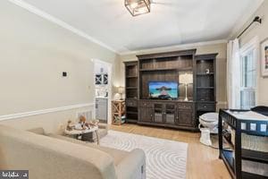 11050 Stonebrook Dr, Manassas, VA 20112 - living area with wood finished floors and crown molding