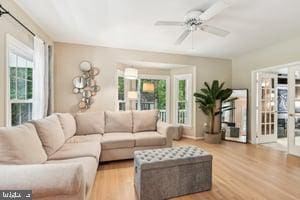 11050 Stonebrook Dr, Manassas, VA 20112 - living area featuring light wood-style flooring and a ceiling fan