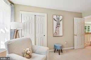 11050 Stonebrook Dr, Manassas, VA 20112 - living area featuring carpet and baseboards