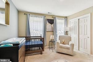 11050 Stonebrook Dr, Manassas, VA 20112 - living area with carpet flooring