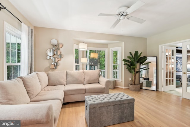 11050 Stonebrook Dr, Manassas, VA 20112 - living area featuring plenty of natural light, light wood finished floors, and ceiling fan
