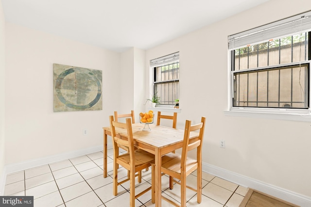 tiled dining area with baseboards