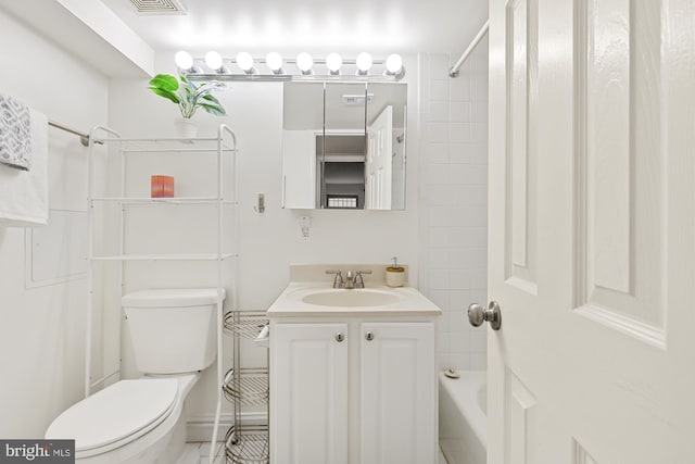 full bath featuring toilet, vanity, and shower / bath combination