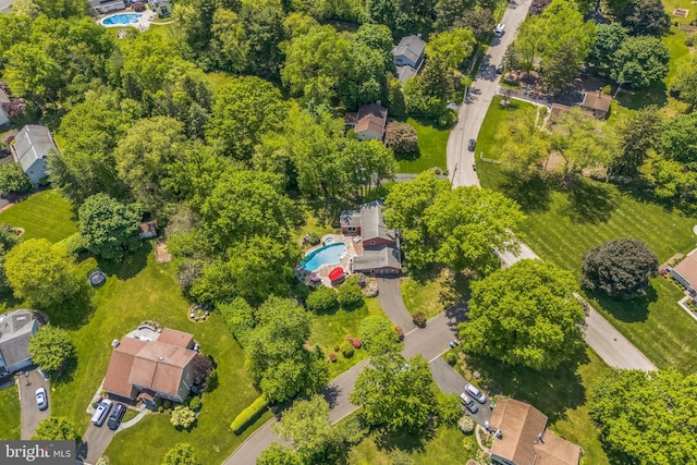 aerial overview of property's location with a pool