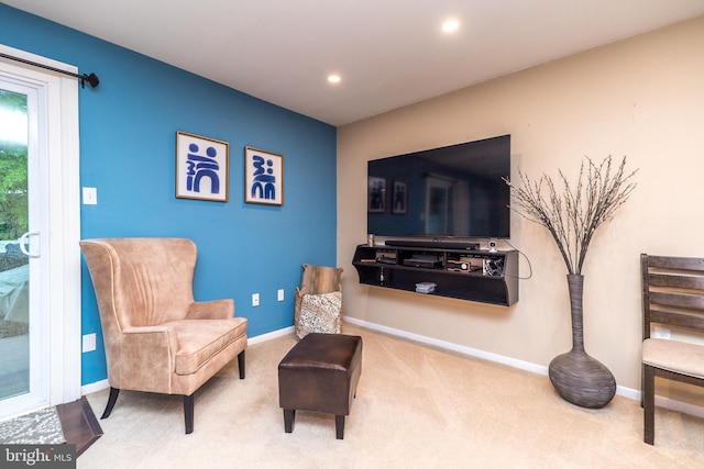 living area with carpet flooring, baseboards, and recessed lighting