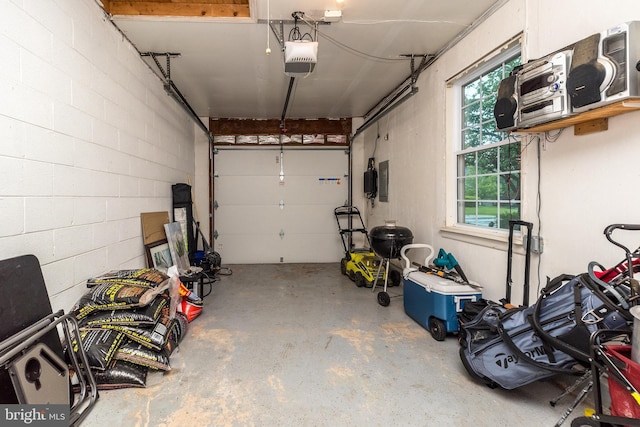 garage featuring a garage door opener