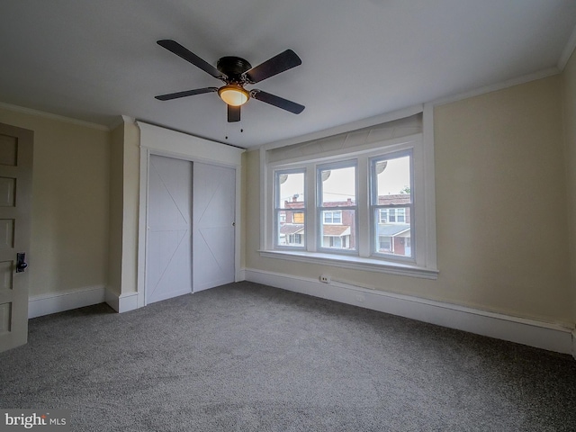 1008 Mcclenahan Ter, Marcus Hook, PA 19061 - unfurnished bedroom with crown molding, carpet floors, baseboards, a closet, and a ceiling fan