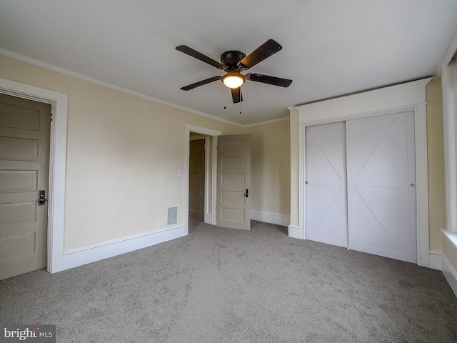 1008 Mcclenahan Ter, Marcus Hook, PA 19061 - unfurnished bedroom with carpet floors, crown molding, a closet, ceiling fan, and baseboards