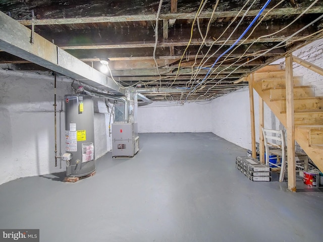 1008 Mcclenahan Ter, Marcus Hook, PA 19061 - unfinished basement featuring water heater, stairs, and heating unit