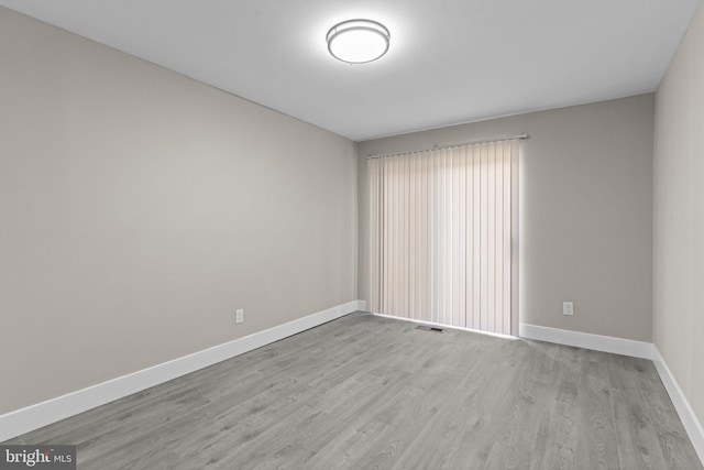 9001 Ridge Ave Unit 14, Philadelphia, PA 19128 - unfurnished room with wood finished floors and baseboards