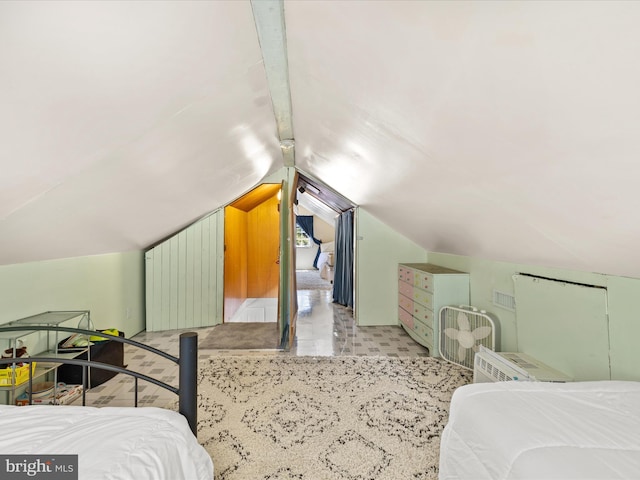 bedroom featuring lofted ceiling