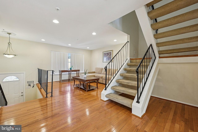 5737 Regency Ln, District Heights, MD 20747 - living room with hardwood / wood-style flooring, stairway, baseboards, and recessed lighting