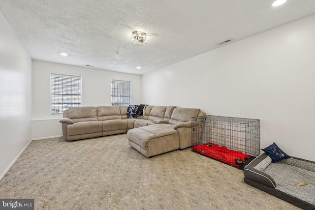 5737 Regency Ln, District Heights, MD 20747 - carpeted living room featuring recessed lighting, a textured ceiling, and baseboards