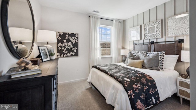 carpeted bedroom with baseboards