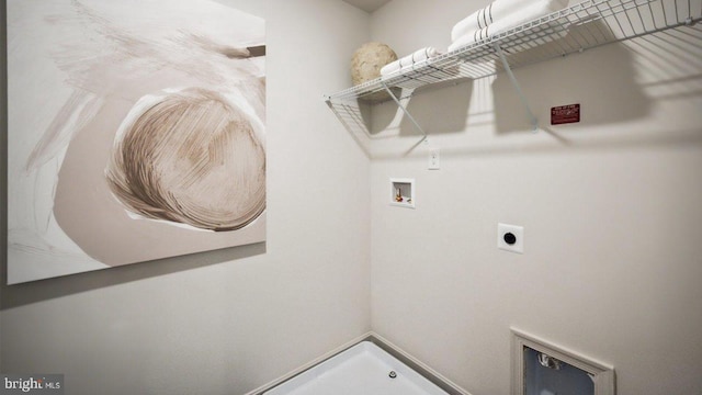 washroom featuring hookup for a washing machine and electric dryer hookup