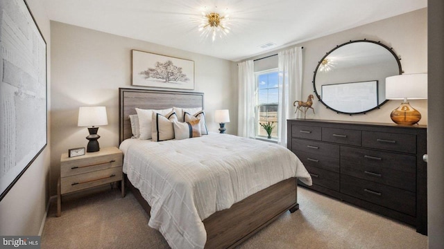 bedroom featuring light carpet