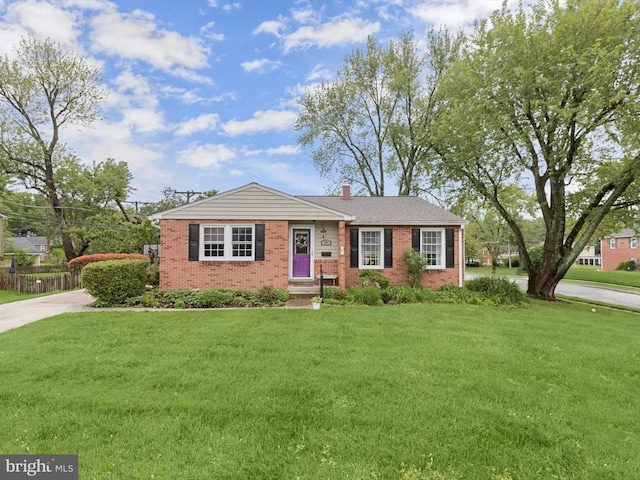 101 Gothard Rd, Lutherville Timonium, MD 21093 - single story home with brick siding, a chimney, and concrete driveway