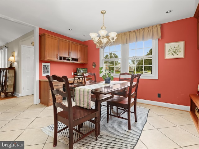101 Gothard Rd, Lutherville Timonium, MD 21093 - dining space featuring light tile patterned flooring, a chandelier, and baseboards