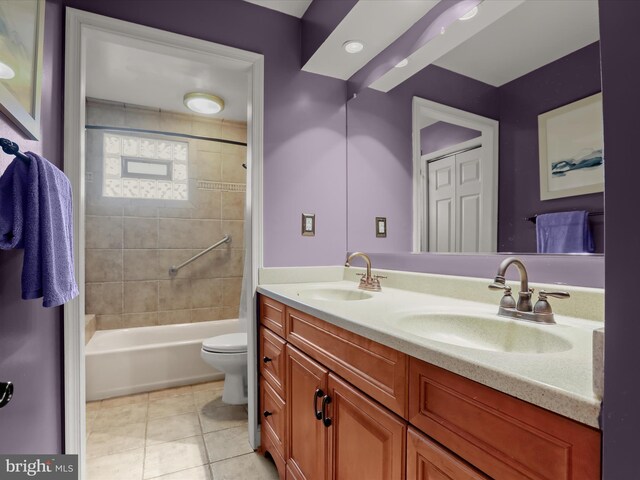 101 Gothard Rd, Lutherville Timonium, MD 21093 - full bath with double vanity, toilet, shower / tub combination, and tile patterned floors