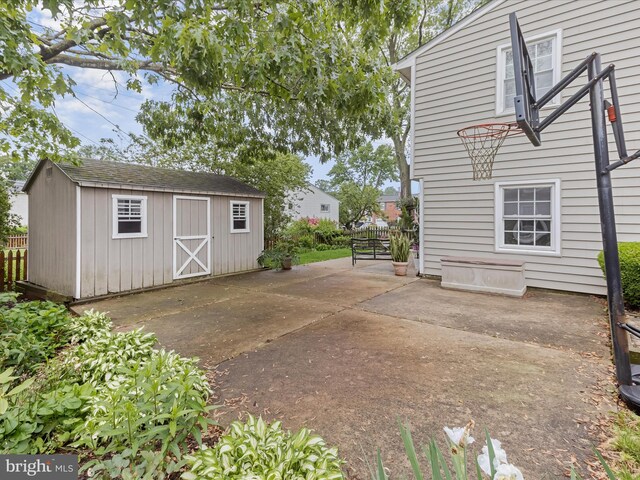 101 Gothard Rd, Lutherville Timonium, MD 21093 - view of home's exterior with an outdoor structure, a shed, and a patio