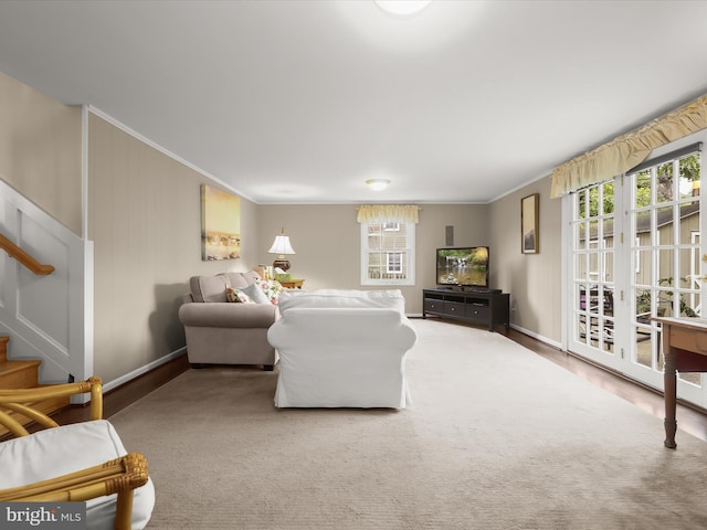 101 Gothard Rd, Lutherville Timonium, MD 21093 - living area featuring ornamental molding, healthy amount of natural light, stairs, and baseboards