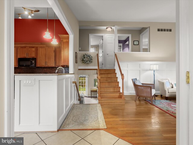 101 Gothard Rd, Lutherville Timonium, MD 21093 - foyer entrance with stairway and light wood-style floors