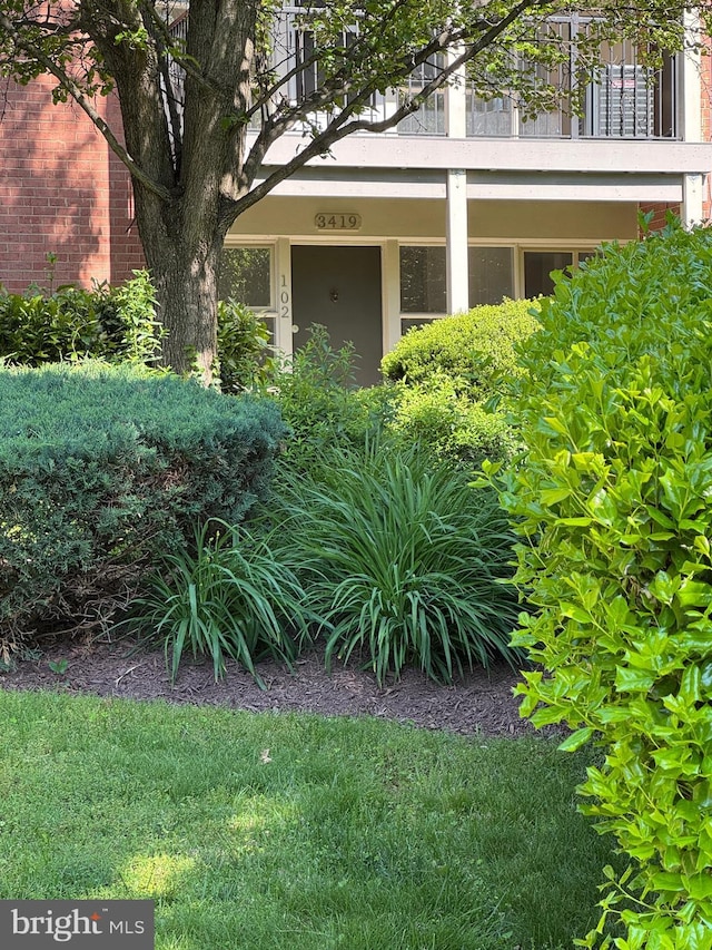 3419 University Blvd W Unit 102, Kensington, MD 20895 - view of exterior entry with a balcony