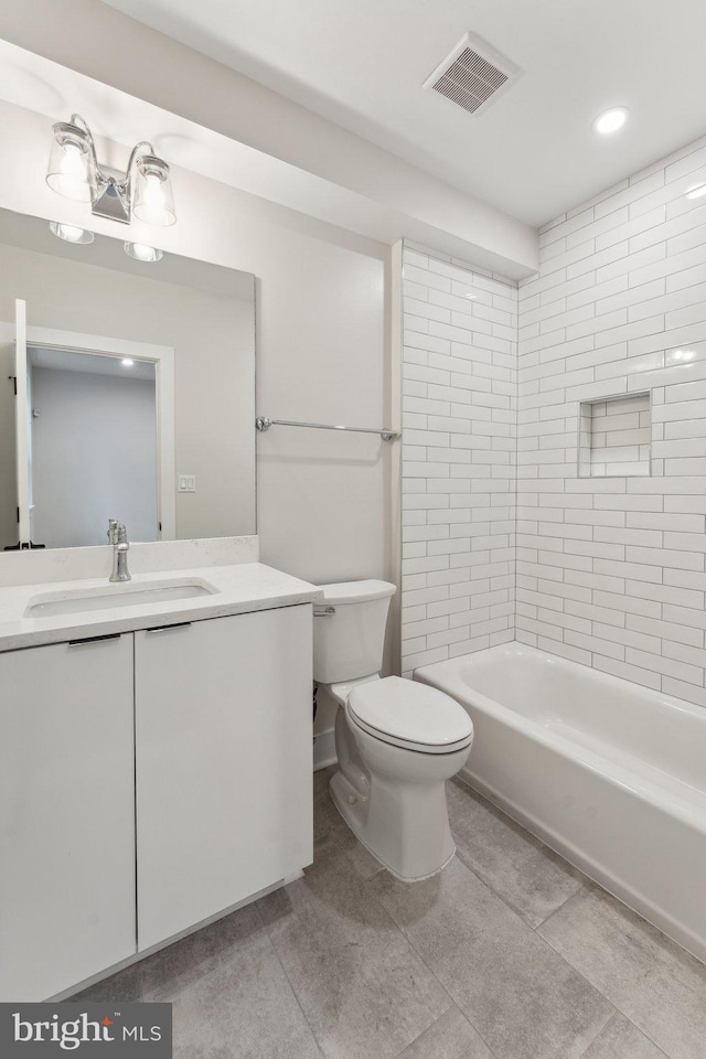 1645 W Virginia NE Unit 1, Washington, DC 20002 - full bath with toilet, vanity, tile patterned flooring, recessed lighting, and shower / bath combination