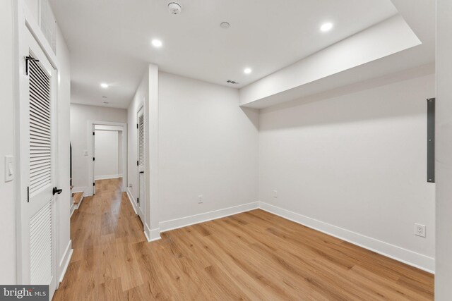 1645 W Virginia NE Unit 1, Washington, DC 20002 - basement with baseboards, light wood-style floors, recessed lighting, and electric panel