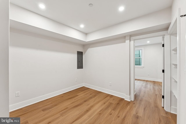 1645 W Virginia NE Unit 1, Washington, DC 20002 - unfurnished room featuring electric panel, light wood-type flooring, recessed lighting, and baseboards