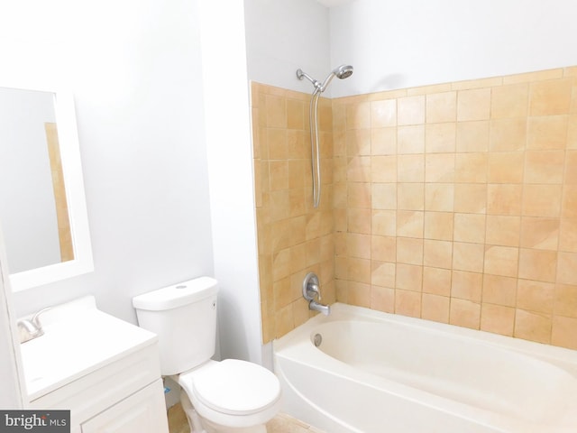 bathroom featuring vanity, toilet, and shower / washtub combination