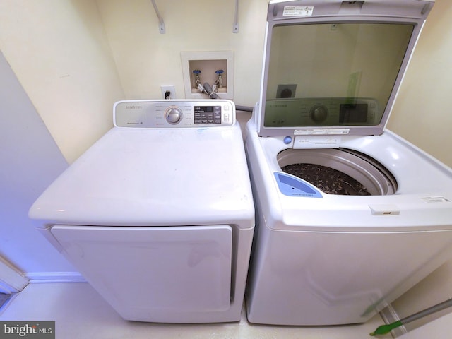 29 Ferns Ct, Lutherville Timonium, MD 21093 - laundry room featuring separate washer and dryer