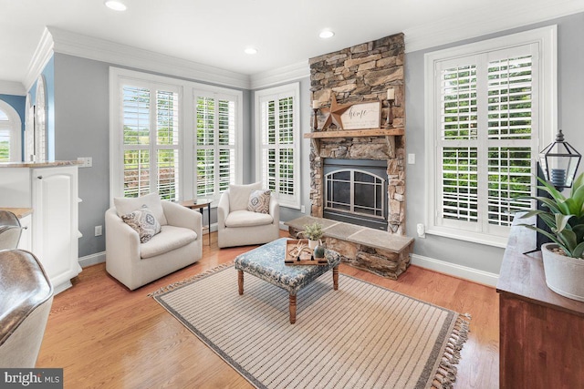 8170 Hollow Rd, Middletown, MD 21769 - living room featuring ornamental molding, baseboards, a fireplace, light wood-type flooring, and recessed lighting