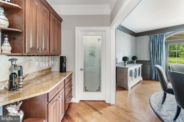 8170 Hollow Rd, Middletown, MD 21769 - kitchen featuring open shelves, ornamental molding, light wood-style floors, tasteful backsplash, and light stone counters