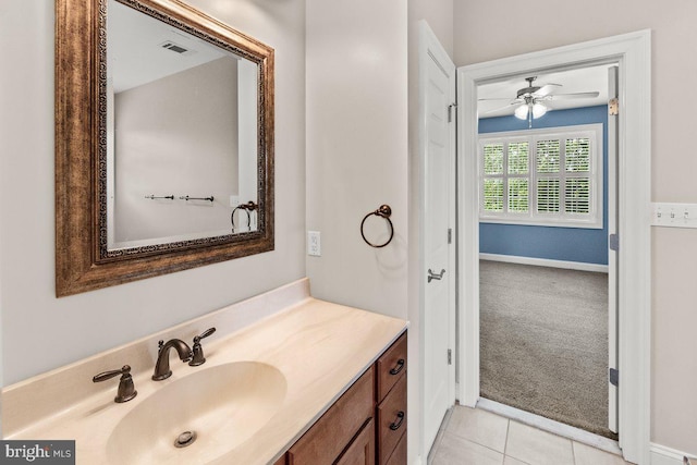 8170 Hollow Rd, Middletown, MD 21769 - bathroom with vanity, a ceiling fan, tile patterned flooring, and baseboards