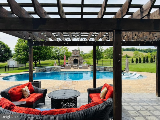 8170 Hollow Rd, Middletown, MD 21769 - view of swimming pool featuring a pergola, a patio, a pool with connected hot tub, and an outdoor living space with a fireplace