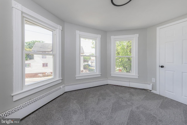 127 N Broad St, Penns Grove, NJ 08069 - unfurnished room with carpet, a baseboard heating unit, and baseboards