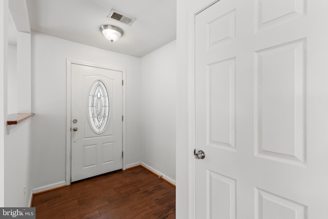 7900 Foote Ln, Springfield, VA 22151 - foyer entrance featuring baseboards and dark wood-style flooring