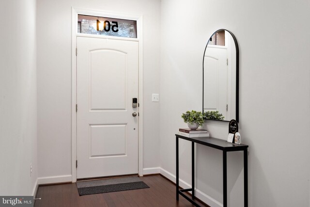 501 Triggerfish Dr, Oxon Hill, MD 20745 - foyer entrance with dark wood-style floors and baseboards