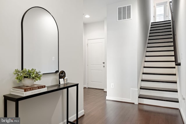 501 Triggerfish Dr, Oxon Hill, MD 20745 - hall featuring stairway, dark wood-type flooring, baseboards, and recessed lighting